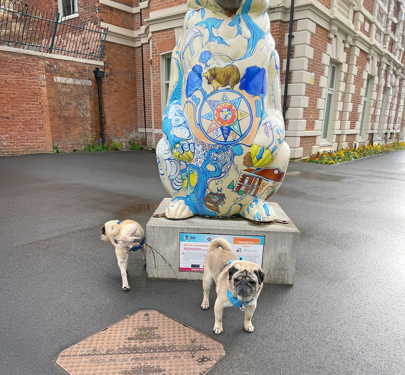 Buster & Bentley christening the local artwork